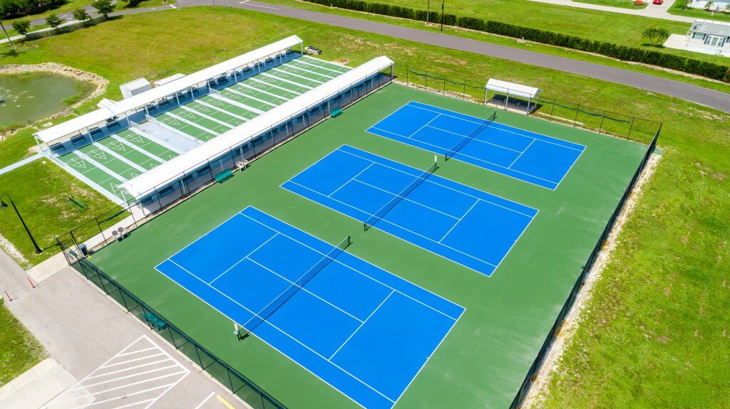 Aerial view of pickleball courts within the manufactured home community